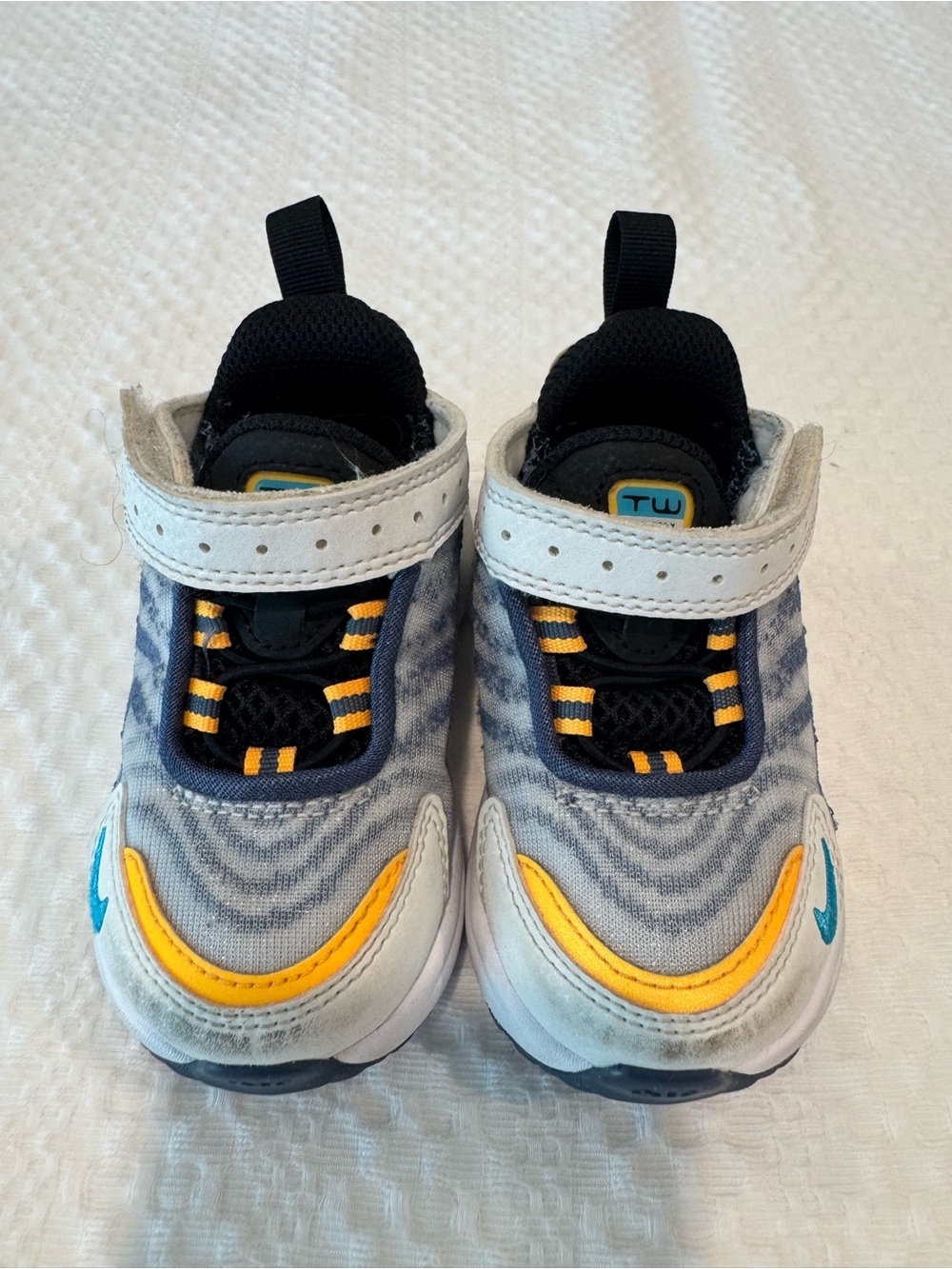 Nike Kids Sneakers in White, Black, Yellow & Blue